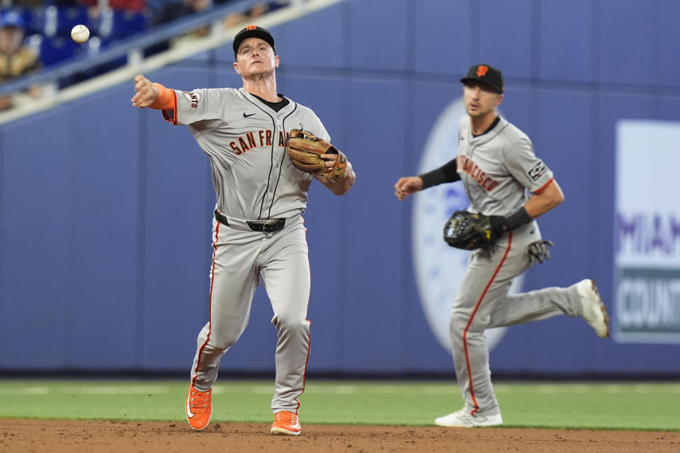 San Francisco Giants third baseman Matt Chapman (26) throws to first base for an out during the second inning of a baseball game against the Miami Marlins, Wednesday, April 17, 2024, in Miami. (AP Photo/Marta Lavandier)