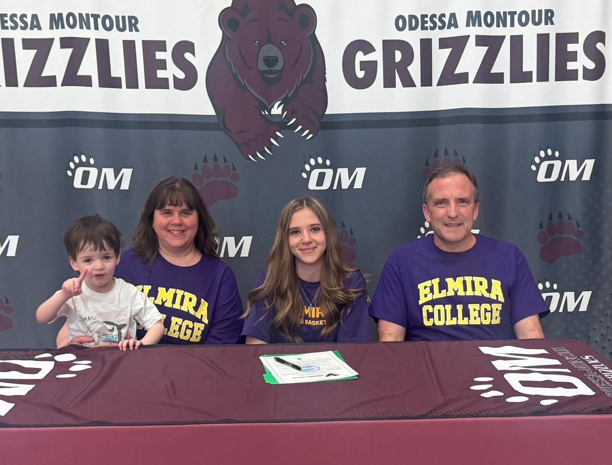 Odessa-Montour senior Gina Gavich, who has signed to play basketball at Elmira College, was celebrated during a ceremony at the O-M cafeteria March 27, 2024. Also pictured are parents, Greg and Tracy Gavich, and Gina's nephew, Carter Brown.
