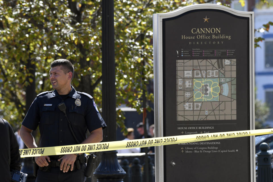 Police gather near the Capitol South Station Metro stop near Capitol Hill in Washington, Friday, Oct. 11, 2019. Police say a boy has been stabbed and seriously injured near the Capitol. The Metropolitan Police Department says officers are looking for a 14-year-old girl in connection with the stabbing. (AP Photo/Susan Walsh)