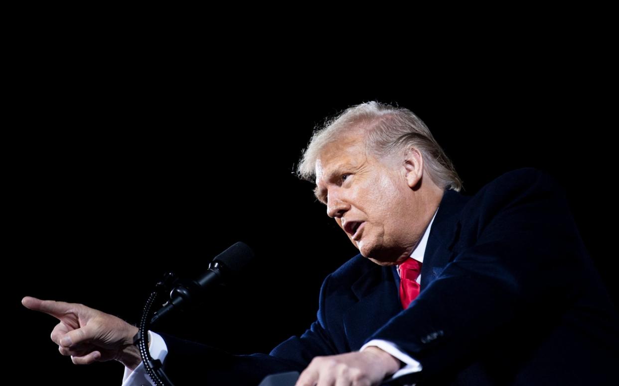 US President Donald Trump speaks at a "Great American Comeback" rally in Fayetteville, North Carolina - AFP