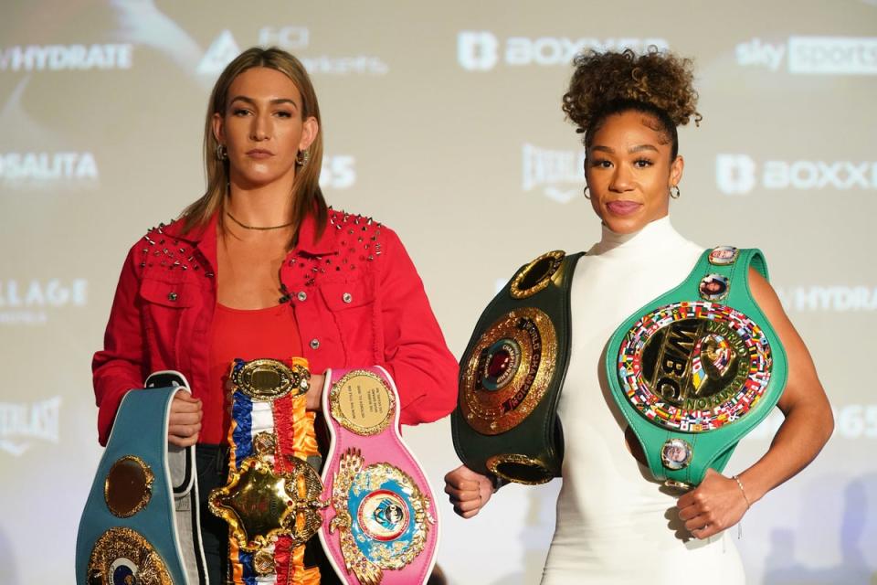 Mikaela Mayer (left) and Alycia Baumgardner during a press conference (PA)