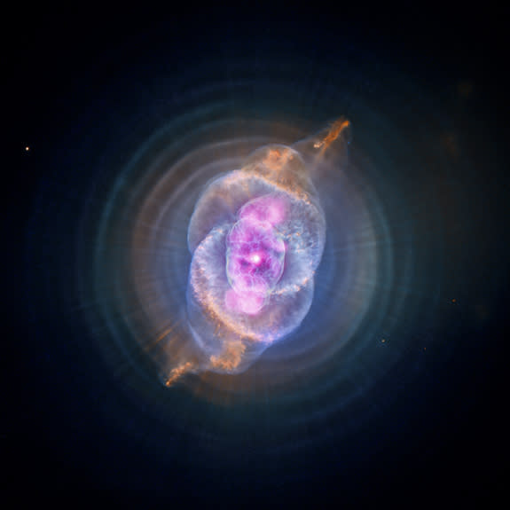 This image is NGC 6543 known as the Cat's Eye Nebula as it appears to the Chandra X-Ray Observatory and Hubble Telescope. A planetary nebula is a phase of stellar evolution that the sun should experience several billion years from now, when it