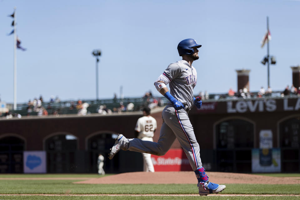 Texas Rangers' David Dahl runs the bases after hitting a solo home run against the San Francisco Giants during the seventh inning of a baseball game in San Francisco, Tuesday, May 11, 2021. (AP Photo/John Hefti)