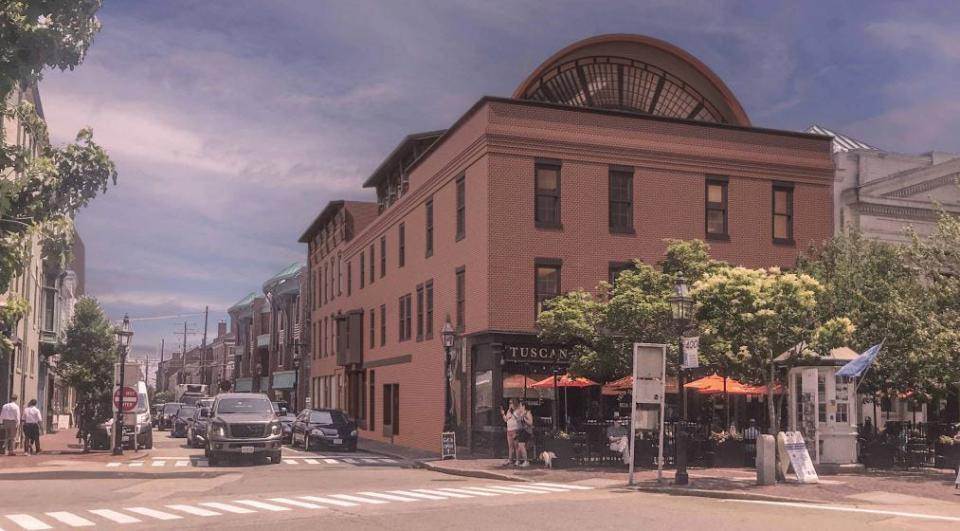 The vision for an addition atop 14 Market Square in Portsmouth, the landmark downtown building that houses Tuscan Market on the top floor, was criticized by members of the city Historic District Commission.