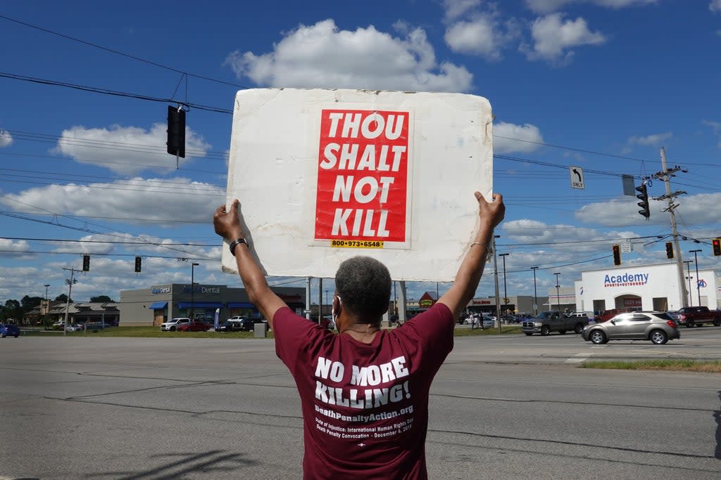 Sylvester Edwards expresses his opposition to the death penalty during a protest near the Federal Correctional Complex in Terre Haute, Indiana (Getty Images)