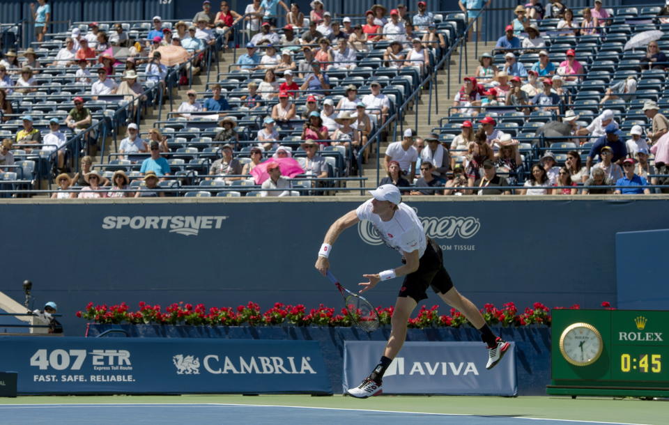 Kevin Anderson of South Africa serves in front of sparsely filled stands on his way to defeating Grigor Dimitrov of Bulgaria during Rogers Cup quarterfinal tennis tournament action in Toronto on Friday, Aug. 10, 2018. (Frank Gunn/The Canadian Press via AP)