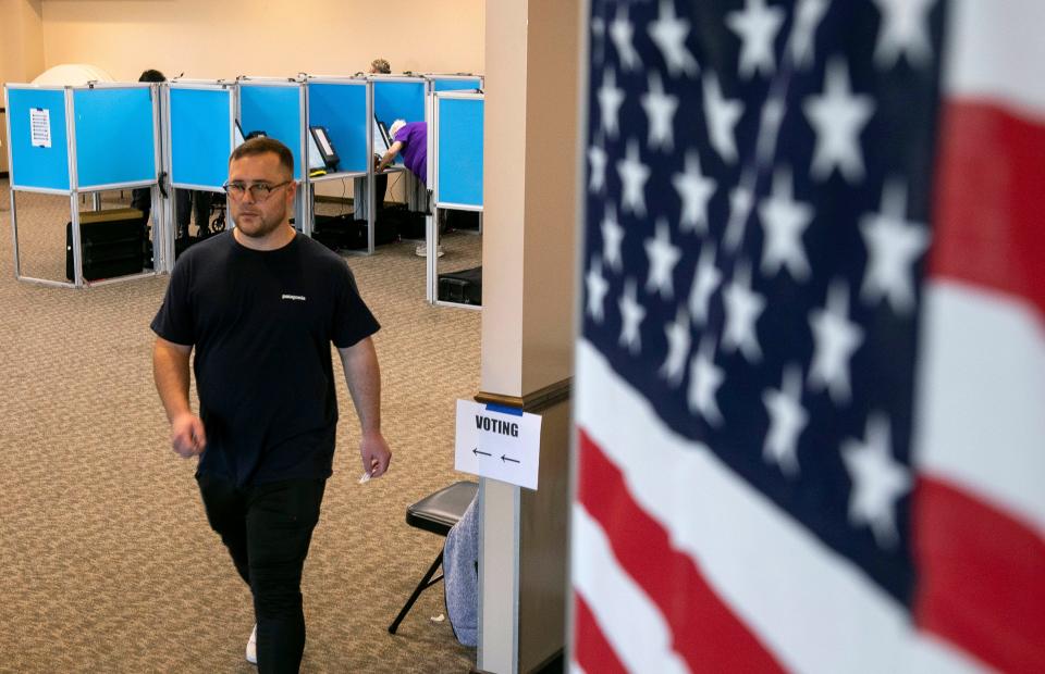 Nathan Welshhans, of Lancaster, walks out of the Pleasant Township Fire Department after casting his vote in the Ohio election on November 8, 2023, in Lancaster, Ohio,