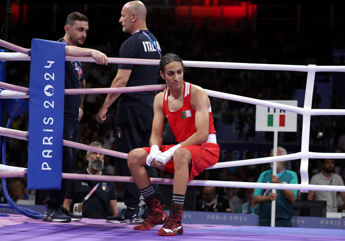 Olympic boxer at center of gender eligibility controversy wins bizarre first bout