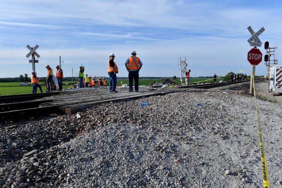 Several cars of an Amtrak train traveling from Los Angeles to Chicago derailed Monday afternoon after it struck a dump truck at a crossing in northern Missouri, Amtrak announced. More than 200 people were on board the train at the time of the crash, which was first reported about 12:43 p.m. near Mendon, Missouri, according to the Missouri State Highway Patrol. Three people were killed in the crash, the patrol said, including two people on the train and one person in the dump truck. This picture is looking east into the intersection.