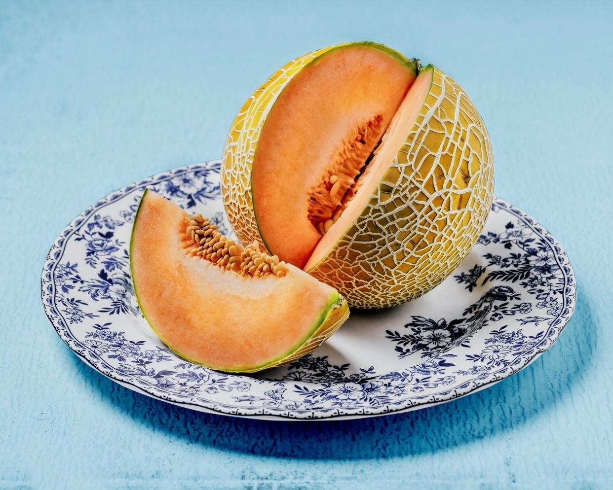 Cantaloupe Health Benefits: sliced cantaloupe on a plate