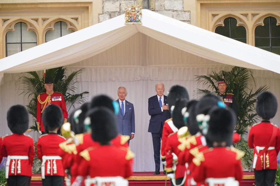 King Charles III and US President Joe Biden inspect the Guard of Honour from the Prince of Wales's Company of the Welsh Guards (PA)
