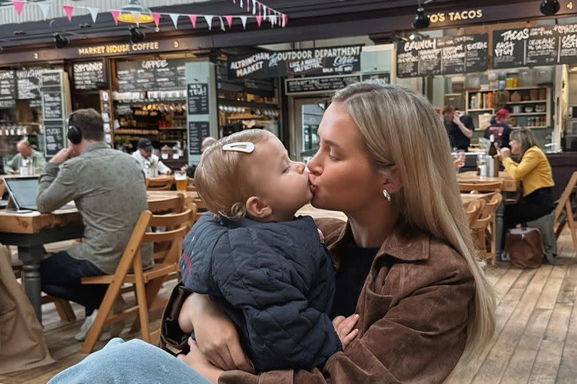 Molly-Mae Hague kissing her daughter Bambi