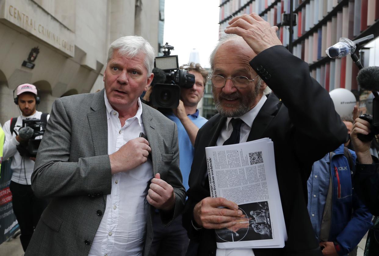 Editor-in-chief of WikiLeaks, Kristinn Hrafnsson from Iceland, left, and father of Julian Assange, John Shipton, speak to the media in London on Monday, Sept. 7, 2020. Lawyers for WikiLeaks founder Julian Assange and the U.S. government were squaring off in a London court on Monday at a high-stakes extradition case delayed by the coronavirus pandemic. American prosecutors have indicted the 49-year-old Australian on 18 espionage and computer misuse charges over the WikiLeaks publication of secret U.S. military documents a decade ago. The charges carry a maximum sentence of 175 years in prison.