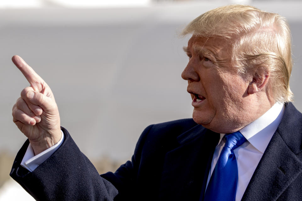 President Donald Trump tells a reporter to be quiet as he speaks on the South Lawn of the White House in Washington, Friday, Nov. 8, 2019, before boarding Marine One for a short trip to Andrews Air Force Base, Md. and then on to Georgia to meet with supporters. (AP Photo/Andrew Harnik)