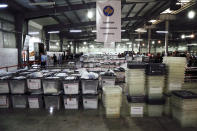 Ballot boxes are seen at Central Election Committee counting center in Fushe Kosove, Kosovo, on Monday, Oct. 7, 2019. Kosovo's opposition parties have won a snap election, overcoming the former independence fighters who have governed the country since its war 20 years ago. With 96% of the votes counted Monday the left-wing Movement for Self-Determination Party, or LVV, has 26% of the votes, one percentage point more than the conservative Democratic League of Kosovo, or LDK, also formerly in opposition. (AP Photo/Visar Kryeziu)