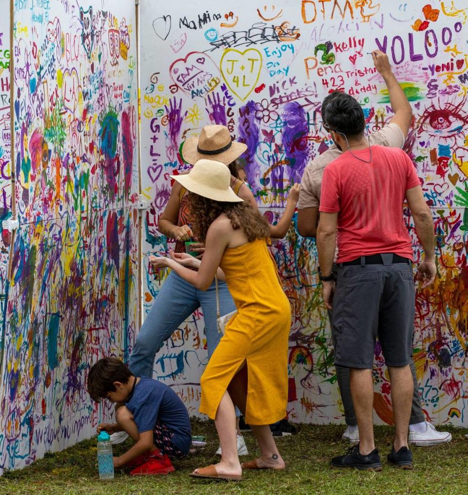 Attendees enjoying an interactive art installation during the 2022 Coconut Grove Arts Festival on Feb. 20, 2022. Daniel A. Varela/dvarela@miamiherald.com