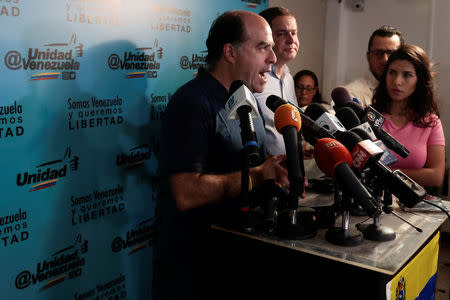 Julio Borges (L), president of the National Assembly and lawmaker of the Venezuelan coalition of opposition parties (MUD) talks to the media during a news conference in Caracas, Venezuela, September 16, 2017. REUTERS/Marco Bello