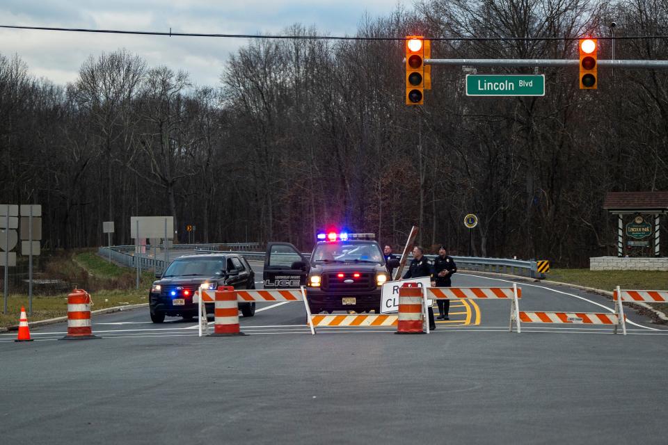Jan 10, 2024; Lincoln Park, NJ, USA; Police set up a roadblock on Two Bridges Road at the intersection Lincoln Blvd. in Lincoln Park, NJ on Wednesday. Water levels are expected to rise in Lincoln Park in the evening.