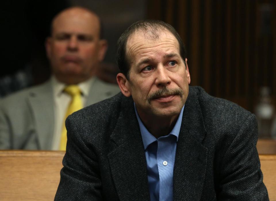 Theodore Wafer listens during a motion hearing in Judge Timothy Kenny's courtroom at the Frank Murphy Hall of Justice in Detroit, Friday, April 25, 2014. Wafer has been accused of fatal shooting 19-year-old Renisha McBride on the porch of his home. Kenny removed Judge Qiana Lillard on Friday from the case of Wafer. Defense attorneys argued Lillard's previous employment with the prosecutor's office and associations with employees created an appearance of impropriety. (AP Photo/Detroit Free Press, Eric Seals) DETROIT NEWS OUT; NO SALES