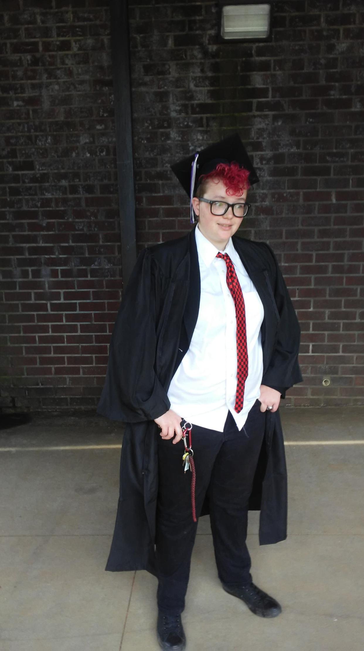 Amanda Dixon's daughter wore a white button up, a tie and black converse to her high school graduation ceremony. (Credit: Amanda Dixon)