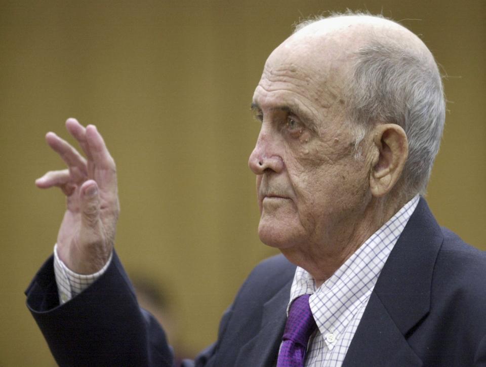 FILE - In this Thursday, May 16, 2002 file photo, retired Boston Red Sox spring training clubhouse manager Donald Fitzpatrick, 73, of Boston, holds up his hand as he takes an oath during his court hearing at the Polk County Courthouse in Bartow, Fla. Fitzpatrick, who served as clubhouse manager from 1970-1992, admitted to sexually abusing four boys during spring training. (AP Photo/Greg Fight, Pool)