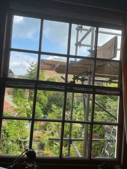 The scaffolding blocking the view from Gill Hayes-Newington's bedroom window. (SWNS)