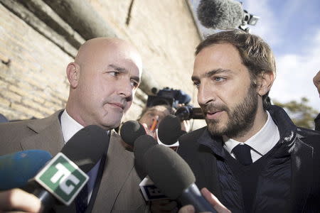 Journalists Gianluigi Nuzzi (L) and Emiliano Fittipaldi (R) arrive at the Vatican November 24, 2015. REUTERS/Alessandro Bianchi