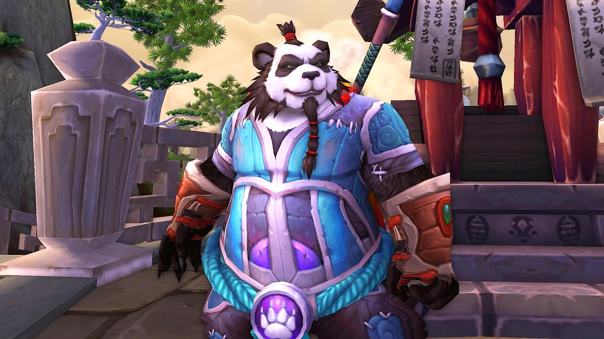  A Pandaren from World of Warcraft wearing blue and purple armor. 