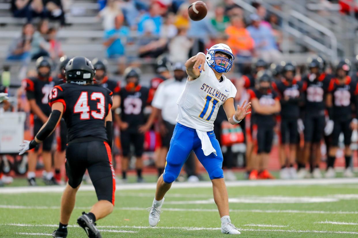 Stillwater’s Chance Acord (11) throws the ball during a high school football game between Stillwater High School and Norman High School in Norman, Okla., on Thursday, Sept. 14, 2023.