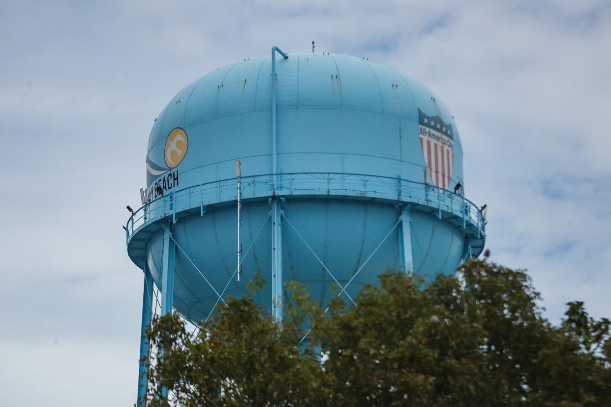 A municipal water tower is visible from the site of a joint press conference with Congresswoman Lois Frankel, D-West Palm Beach and City of Delray Beach Mayor Shelly Petrolia at the Delray Beach water treatment plant in Delray Beach, Fla., on Tuesday, February 8, 2022. Frankel explained how federal infrastructure dollars from the American Rescue Plan Act will have on the city. Mayor Petrolia spoke about the planning steps for the new water treatment facility and numerous other city improvement projects.