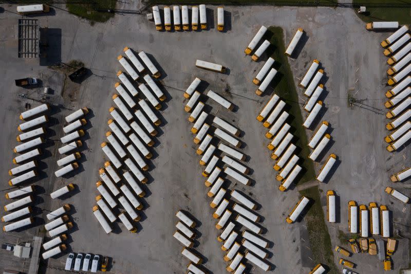 Empty school buses are seen in parking lot amid global outbreak of the coronavirus disease (COVID-19) in Houston, Texas