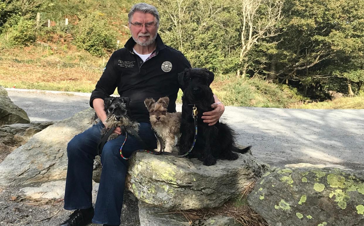 Christopher Joll with his dogs Myrtleberry, Loganberry and Tayberry
