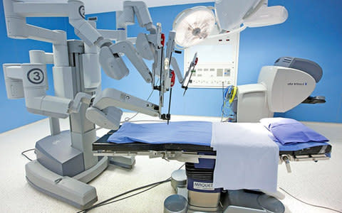 Dozens of Da Vinci robots were bought by the NHS but there is little evidence they are cheaper or better than humans  - Credit: age fotostock / Alamy Stock Photo