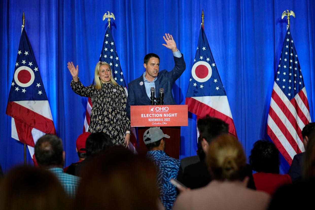 Ohio Secretary of State Frank LaRose waves alongside his wife, Lauren, during an election night party for Republican candidates for statewide offices at the Renaissance Hotel in downtown Columbus in November.