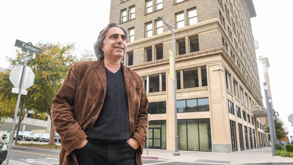 Sevak Khatchadourian, owner of the Helm Building, in background, and the Pacific Southwest Building, both at Fulton and Mariposa streets in downtown Fresno, was the lone bidder Tuesday, Oct. 10, 2023, for the former University Medical Center in southeast Fresno.
