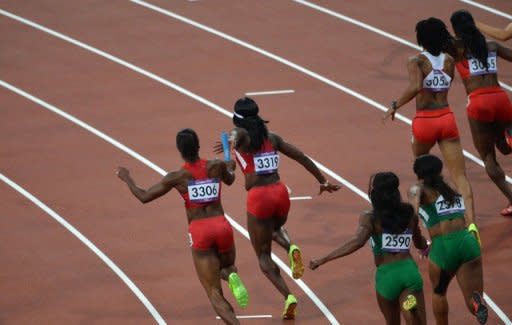 Sprinters are seen competing in the women's 4x100m relay heats at the athletics event during the London 2012 Olympic Games, on August 9. The final is taking place on Friday, with the USA team leading the qualifying times