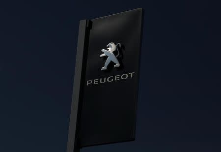 The logo of French car maker Peugeot is seen at a dealership in Nice, France, February 23, 2017. REUTERS/Eric Gaillard