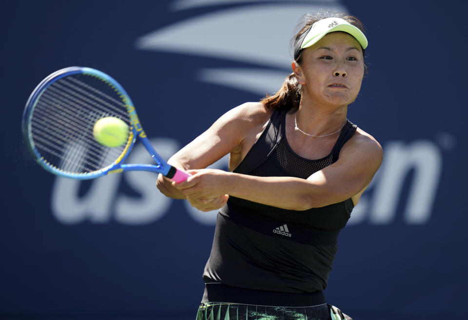FILE - Peng Shuai, of China, returns a shot to Maria Sakkari, of Greece, during the second round of the US Open tennis championships on ug. 29, 2019, in New York. China's Foreign Ministry is sticking to its line that it isn't aware of the controversy surrounding tennis professional Peng Shuai, who disappeared after accusing a former top official of sexually assaulting her. A ministry spokesperson said Friday that the matter was not a diplomatic question and that he was not aware of the situation. (AP Photo/Michael Owens, File)