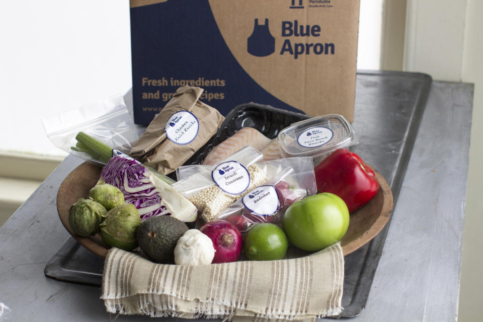 FILE - An example of a home-delivered meal from Blue Apron is displayed, Oct. 6, 2014. Wonder Group announced Friday, Sept. 29, 2023, that it is buying meal kit company Blue Apron for about $103 million as the company looks to enhance its offerings. (AP Photo/Matthew Mead, File)