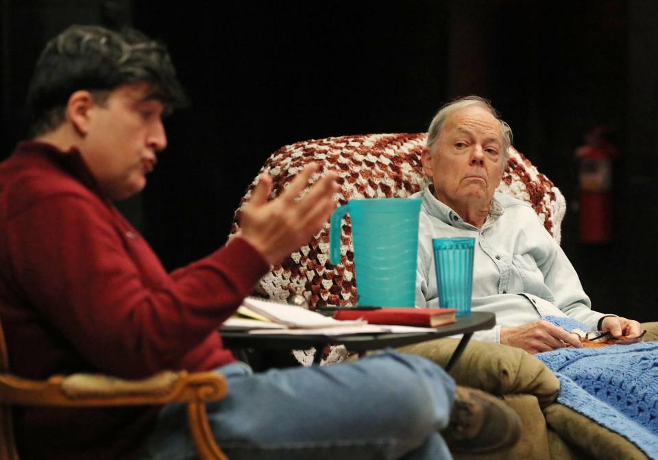 Michael Sonata, right, rehearses for the two-man show "Tuesdays with Morrie" with his co-star, Adam Hoffman, at Magical Theatre Company Wednesday in Barberton.