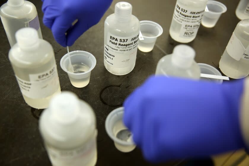 ORANGE COUNTY, CA-OCTOBER 9, 2019: Twan Nguyen checks for chlorine from samples at the Orange County Water District on October 9, 2019 in Orange County, California. Officials will release new water quality results this week that will show widespread contamination of PFAS, a toxic chemical linked to cancer. (Photo By Dania Maxwell / Los Angeles Times)