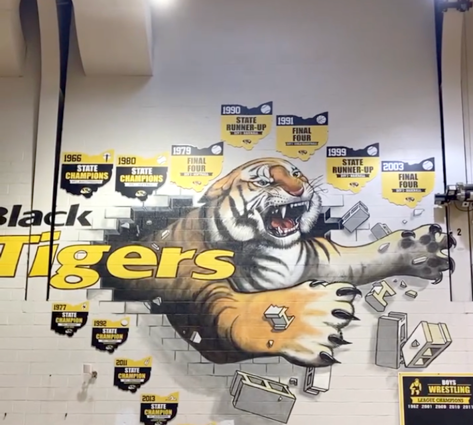 The Black Tiger mural at Cuyahoga Falls High School's Tom Jones Court