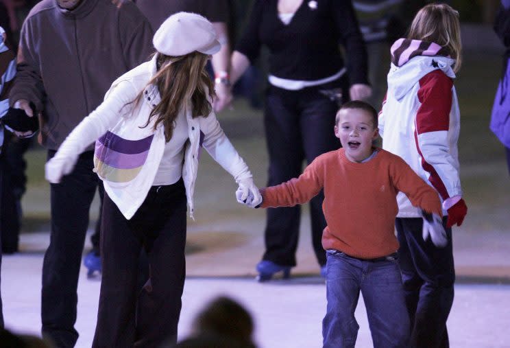 A young Brooklyn Beckham ice skating with Geri Halliwell, aka Ginger Spice, in 2006 (Photo: Getty Images)