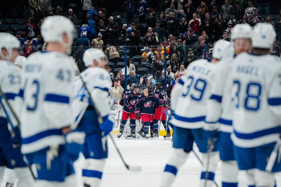Nov 1, 2023; Columbus, Ohio, USA; The Columbus Blue Jackets celebrate their 4-2 win over the Tampa Bay Lightning in the NHL hockey game at Nationwide Arena.