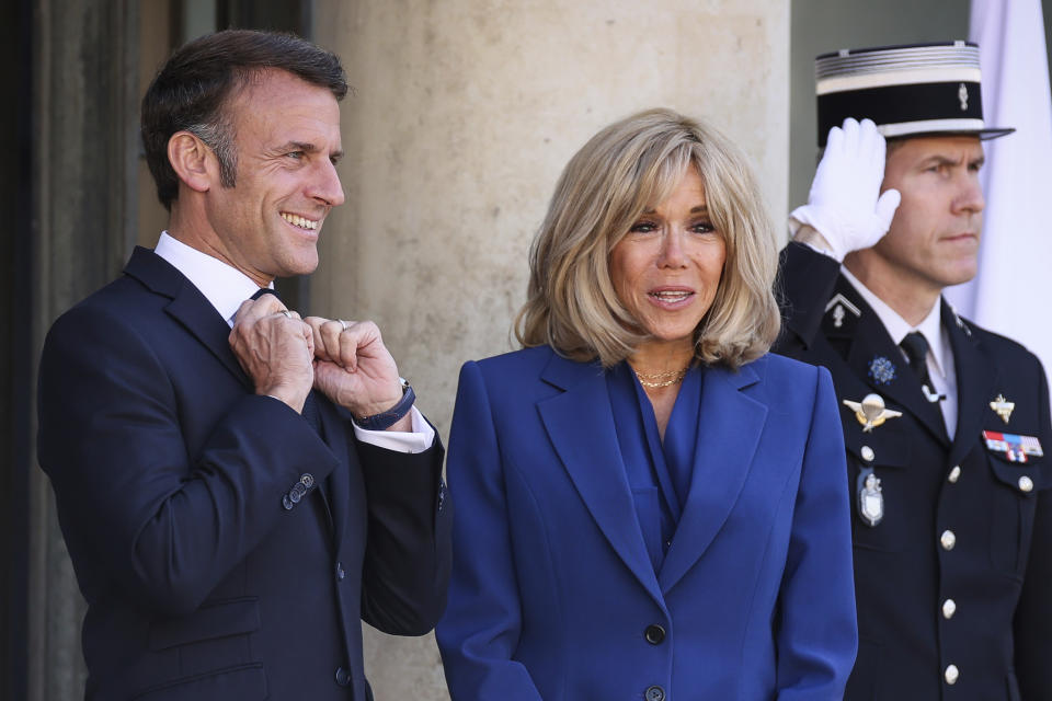 rench President Emmanuel Macron and his wife Brigitte Macron wait for Ukrainian President Volodymyr Zelenskyy and his wife Olena Zelenska, Friday, June 7, 2024 at the Elysee Palace in Paris. U.S. President Joe Biden was due to meet with Ukrainian President Volodymyr Zelenskyy in Paris on Friday as Kyiv's army endures its hardest days of fighting since the early weeks of the war with Russia and prepares for what officials say could be a tough summer ahead. (AP Photo//Thomas Padilla)