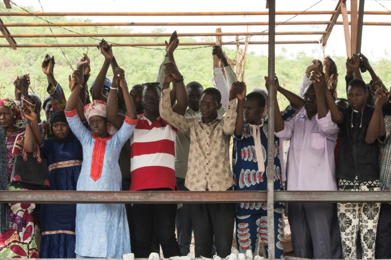 Relatives and friends pay homage to victims of the June 18 terrorist attack at the Campement Kangaba resort, close to Bamako