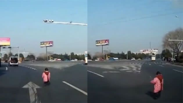 The toddler can be seen running after the vehicle before a passengers from a nearby car scoops up the child. Photo: People's Daily