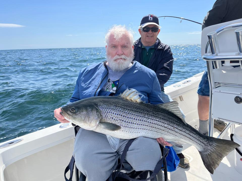 Veteran George St. Hilaire and mate Dennis Abbott fishing on Captain Greg Brown’s Anna B. This is the largest fish of the day at 39”.