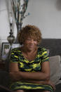 Bonnie Peters sits on her couch as she recalls her grandchild Todriana Peters spending the day with her before going with her cousin to a couple gatherings in New Orleans, Thursday, July 8, 2021. Twelve-year-old Todriana Peters was shot and killed outside a graduation party on Memorial Day Weekend in the Lower 9th Ward neighborhood. Homicide rates in many American cities have continued to rise although not as precipitously as the double-digit jumps seen in 2020 and still below the violence of the mid-90s. (AP Photo/Sophia Germer)