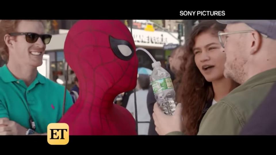 Tom Holland drinking through his eye. (Photo: <a href="https://www.etonline.com/media/videos/tom-holland-zendaya-and-jacob-batalon-on-spider-man-far-from-home-full-interview" target="_blank">Sony Pictures/Entertainment Tonight</a>)